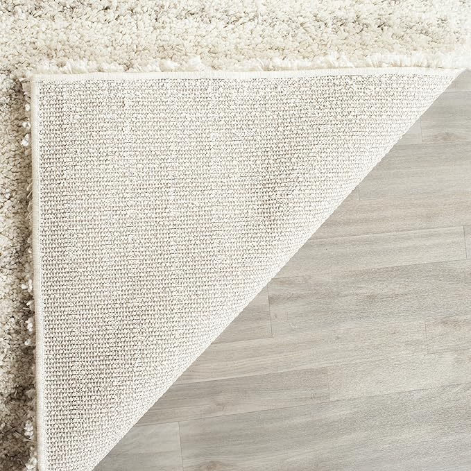 SAFAVIEH Arizona Shag Collection Area Rug - 6'7" x 9'2", Ivory & Beige, Moroccan Design, Non-Shedding & Easy Care, 1.6-inch Thick Ideal for High Traffic Areas in Living Room, Bedroom (ASG741A)
