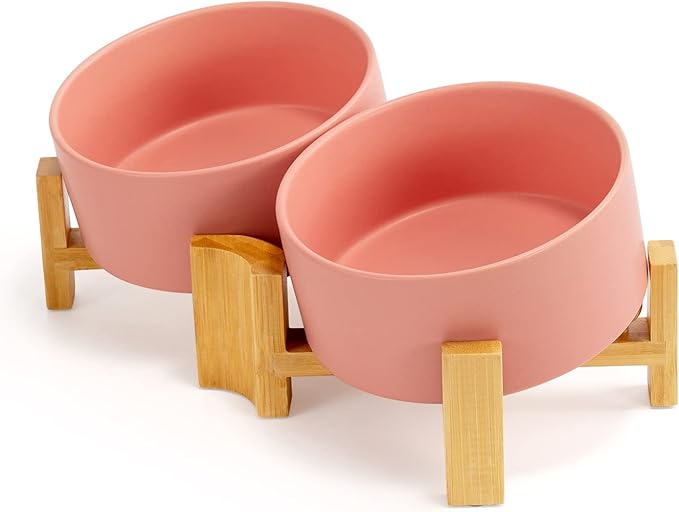 SPUNKYJUNKY 15° Slanted Ceramic Dog and Cat Bowl with Wooden Stand, Tilted Bulldog Food and Water Bowl No Slip Non-Spill for Cats Medium Dogs Big Face Pets 28.7 OZ (3.6 Cups, Pink × 2)-Mewly Pet