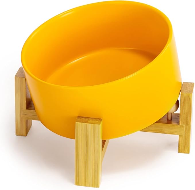 SPUNKYJUNKY 15° Slanted Ceramic Dog and Cat Bowl with Wooden Stand, Tilted Bulldog Food and Water Bowl No Slip Non-Spill for Cats Medium Dogs Big Face Pets 28.7 OZ (3.6 Cups, Yellow)-Mewly Pet