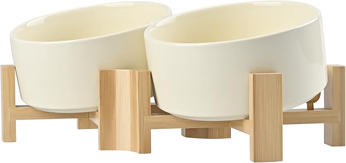 SPUNKYJUNKY 15° Slanted Ceramic Dog and Cat Bowl with Wooden Stand, Tilted Bulldog Food and Water Bowl No Slip Non-Spill for Cats Medium Dogs Big Face Pets 28.7 OZ (3.6 Cups, Beige × 2)-Mewly Pet
