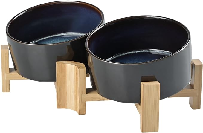 SPUNKYJUNKY 15° Slanted Ceramic Dog and Cat Bowl with Wooden Stand, Tilted Bulldog Food and Water Bowl No Slip Non-Spill for Cats Medium Dogs Big Face Pets 28.7 OZ (3.6 Cups, Starry Blue × 2)-Mewly Pet