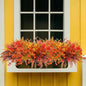15PCS Artificial Fall Plants for Outdoors, Orange Fake Grass Plants Flowers for Autumn Decorations, UV Resistant Faux Foliage Greenery Bushes for Window Porch Garden Yard Décor