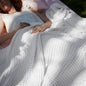Bedsure Cooling Cotton Waffle Queen Size Blanket - Lightweight Breathable Blanket of Rayon Derived from Bamboo for Hot Sleepers, Luxury Throws for Bed, Couch and Sofa, White, 90x90 Inches