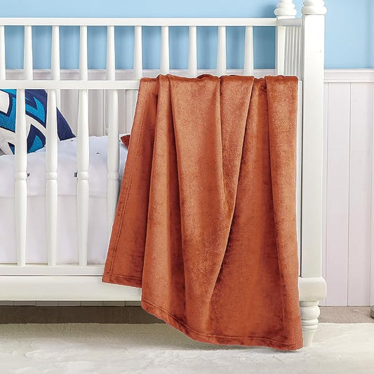 Bedsure GentleSoft Bedding Fleece Blanket for Girls and Boys - Soft Cozy Cute Small Throw Blankets for Travel, 43x55 Inches, Burnt Orange