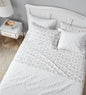 Laura Ashley - Flannel Sheets King Size, Anti-Pilling & Wrinkle Resistant Cotton, Touchably Soft for All-Season Comfort - Bed Sheets with Matching Pillowcases & Fitted Sheet (Rosalie Grey)